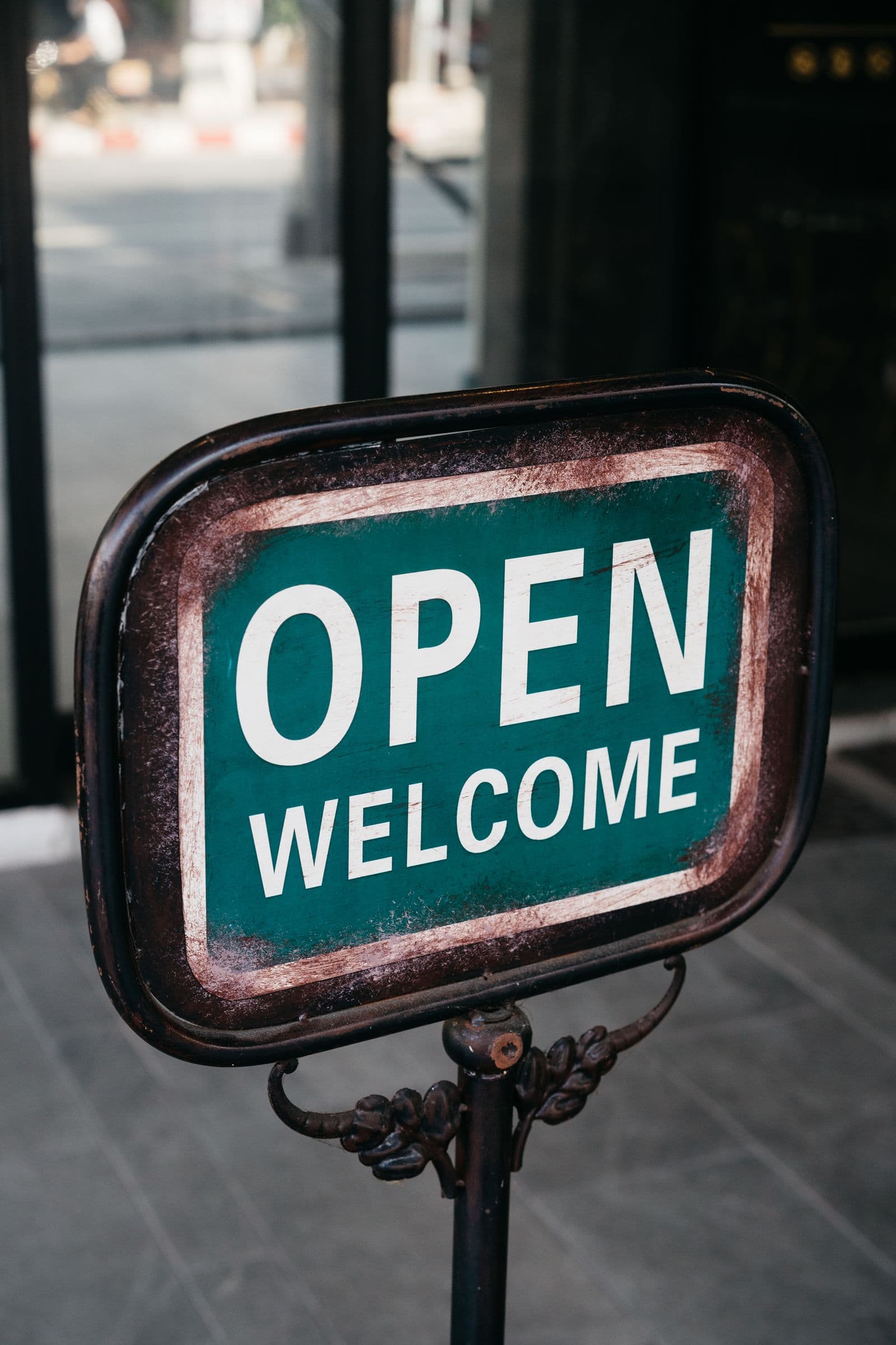 An illuminated open sign in a shop window
